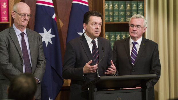 Reverend Tim Costello (left) of the Alliance for Gambling Reform, Senator Nick Xenophon (centre) and Andrew Wilkie MP speak at a press conference outlining their gambling reform agenda for the new parliament on July 14, 2016 in Melbourne.