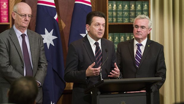 Reverend Tim Costello (left) of the Alliance for Gambling Reform, Senator Nick Xenophon (centre) and Andrew Wilkie MP speak at a press conference outlining their gambling reform agenda for the new parliament on July 14, 2016 in Melbourne.