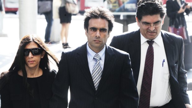 Anthony Sahade, centre, outside court in 2013.