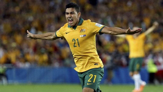 In front: Massimo Luongo celebrates scoring the first goal of the Asian Cup final, putting Australia one up against South Korea.