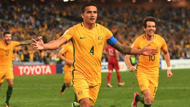 Cometh the hour: Tim Cahill celebrates his extra-time winner.