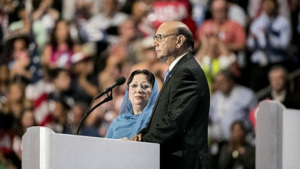 Khizr Khan, with his wife Ghazala, speaks at the Democratic National Convention in Philadelphia.