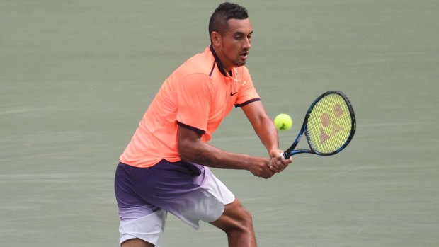 Nick Kyrgios competes against Ryan Harrison of the USA during the men's singles match on day two of the Japan Open.
