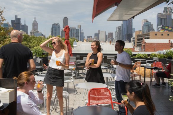 Modern day clubhouse: From the rooftop at Johnny's Green Room, city skyscrapers look close enough to touch.