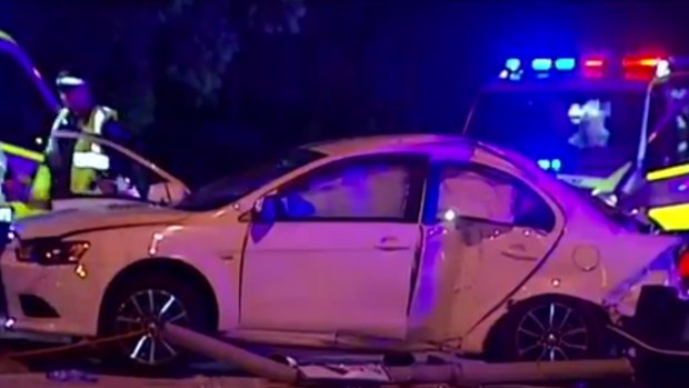 A woman has died and a driver on-the-run, after a two-car crash in Browns Plains.