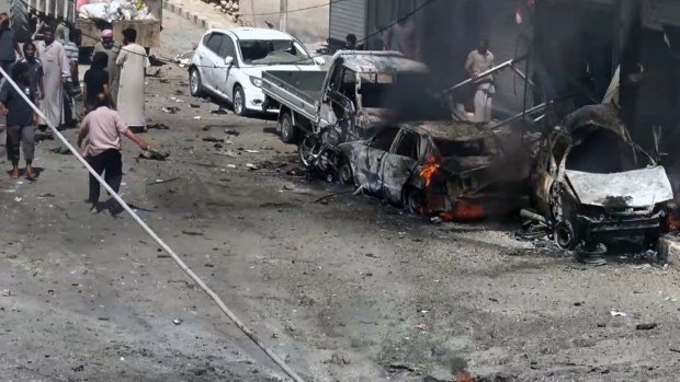 Syrian citizens after airstrikes hit Manbij, Syria.