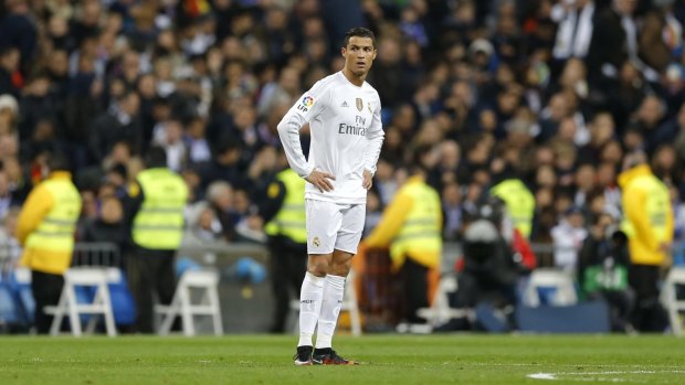 Nonplussed: Cristiano Ronaldo made his displeasure known to teammates after Real Madrid's 4-0 loss to biutter rivals Barcelona.