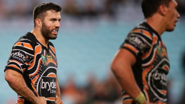 Forgettable night: James Tedesco looks dejected at full-time.