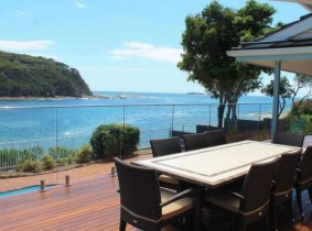 Room with a view: The outlook from the balcony of 6 Iluka Avenue, Malua Bay.