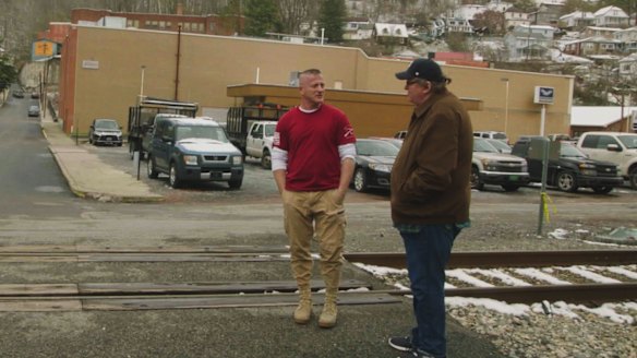 Michael Moore with a disenchanted US voter in Fahrenheit 11/9.