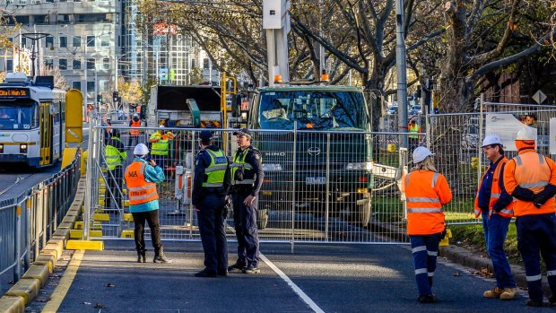 Tree removal on St Kilda Road for the construction of the Metro Rail Tunnel.