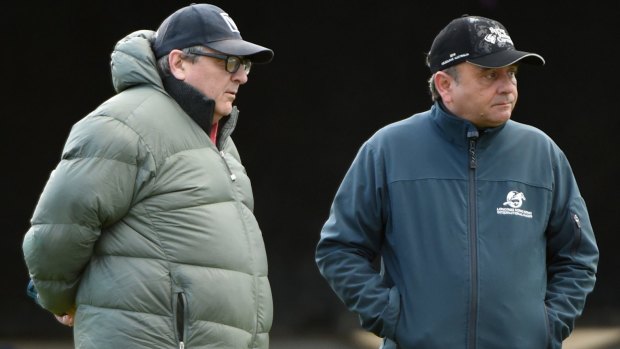 Big weekend: Trainers Lee Freedman and Andreas Wohler (right) watch trackwork at Werribee. Wohler has horses running in Australia and Canada this weekend. 