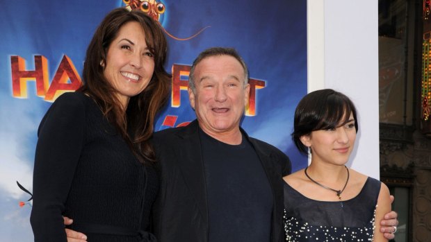 Susan Williams, Robin Williams, and Zelda Williams attend the premiere of "Happy Feet Two" in 2011. 