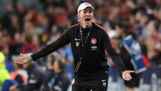 Disbelief: Wanderers caretaker coach Hayden Foxe reacts to the penalty call.