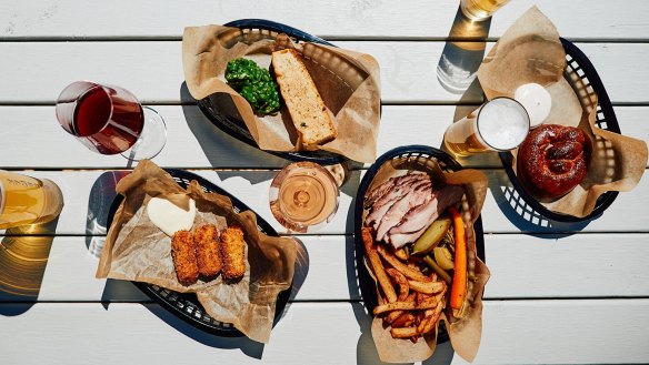 Beer-friendly snacks include a sourdough pretzel (top right).