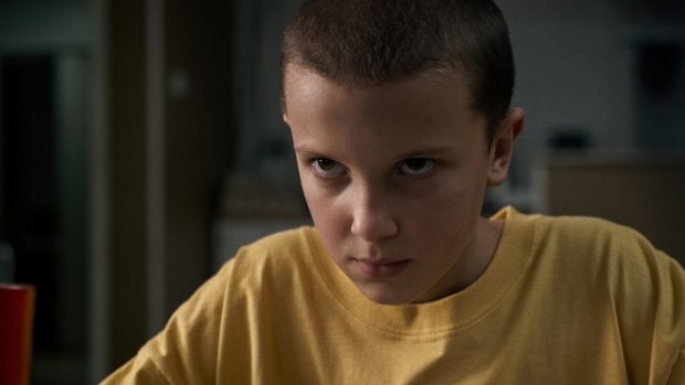 Millie Bobbie Brown as Eleven in the first series of Netflix's <I>Stranger Things</i>.