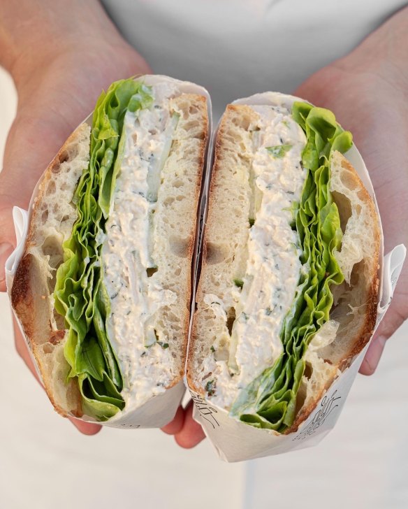 Roast chicken with herb mayo, fresh cucumber and oak lettuce on sourdough Turkish bread at Hector's Deli.