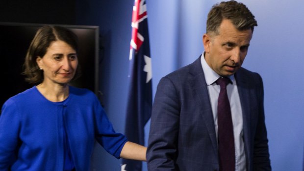 Premier Gladys Berejiklian and Transport Minister Andrew Constance leave a press conference on Thursday afternoon.