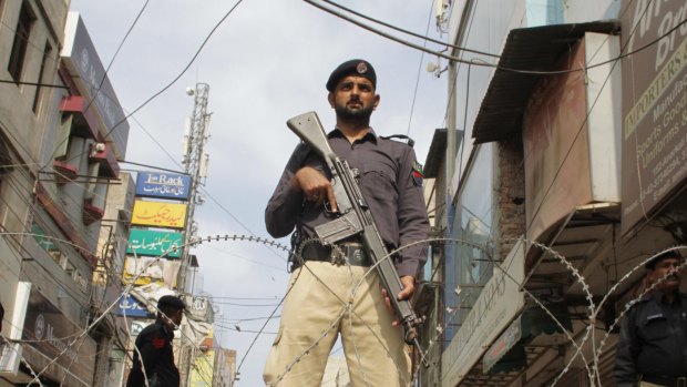 A Pakistani police officer standing guard in Lahore last week. 