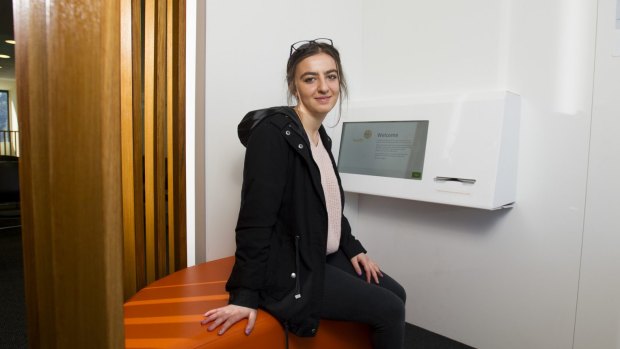 Sevin Pakbaz using the new automated 'pod' at The Ochre Health Medical Centre at the University of Canberra's Health Hub.