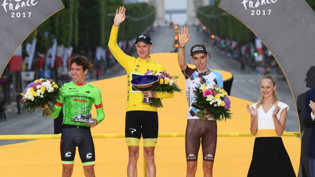 Biggest stage: Winner Chris Froome on the Tour de France podium last year, alongside Rigoberto Uran and Romain Bardet.