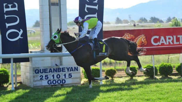 Jockey John Kissick aboard Hudson Country takes out the Queanbeyan Cup.