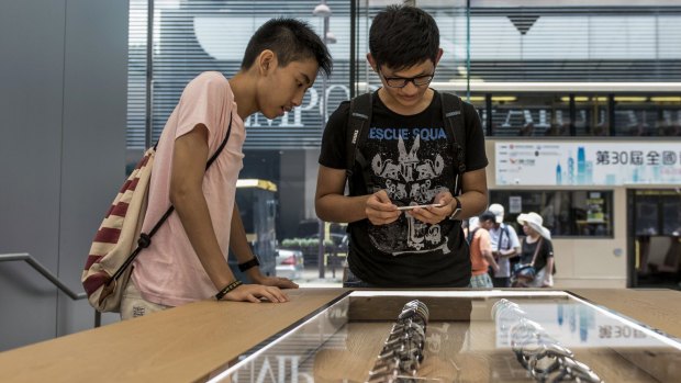 Apple CEO Tim Cook said the company had been seeing "strong growth" in China through July and August.