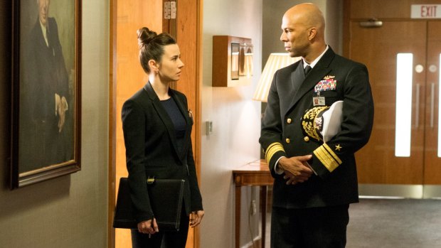 Linda Cardellini (left) and Common in the absorbing film that mixes underwater action with a Russian military coup and high-stakes debate in Washington.