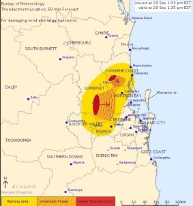The warning issued by the Bureau of Meteorology shows two severe storm cells moving across Queensland's south east.