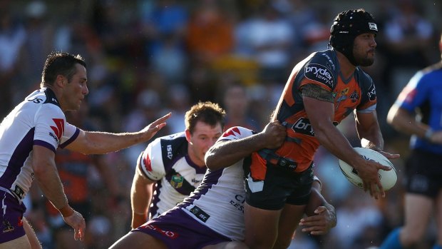 Chased Down: Wests Tigers can't back up a strong first-half performance and are reeled in by a more experienced Melbourne Storm.