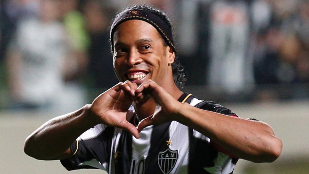 Legend: Ronaldinho playing for Atletico Mineiro in 2013.