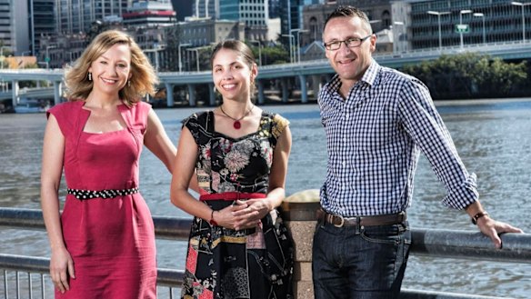 Queensland Greens leader Senator Richard di Natale with deputy leader Senator Larissa Waters and candidate Kirsten Lovejoy. They will call for an inner-city school to built within the new Queens Wharf resort behind them near George Street.