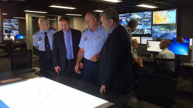 Assistant Commissioner Katarina Carroll, Parliamentary Secretary Josh Frydenberg, Inspector Steve Donnolly from the G20 Group and Queensland Police Minister Jack Dempsey at the $4.5 million G20 Police Operations Centre.