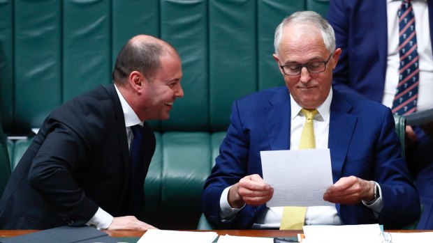 Minister for Environment and Energy Josh Frydenberg and Prime Minister Malcolm Turnbull during Question Time at Parliament House.