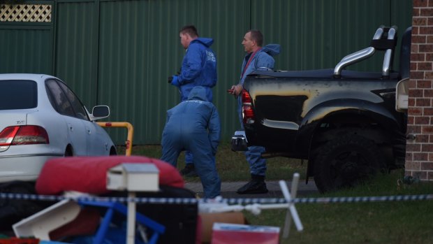 A man in his 30s was shot dead outside a house in Sydney's west.