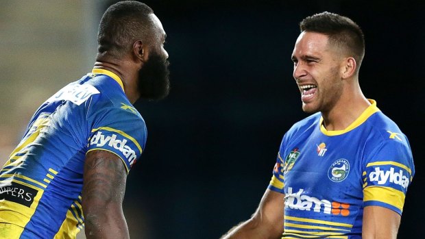 Semi Radradra celebrates with Corey Norman after scoring one of two tries during the Eels second win of the season. 
