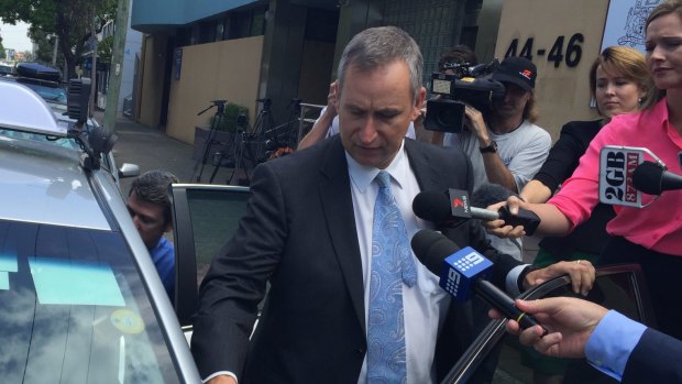 Pitt Town Public School principal Michael Miller leaves the NSW Coroner's Court. 