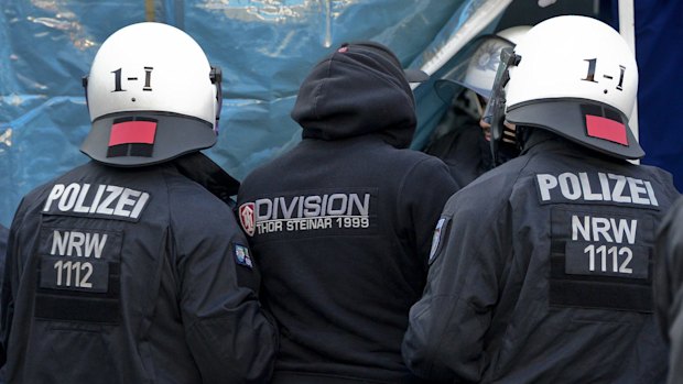 Police control a protest against the New Year's Eve attacks Cologne.