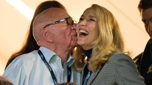 Sealed with a kiss: Rupert Murdoch and Jerry Hall on Saturday.