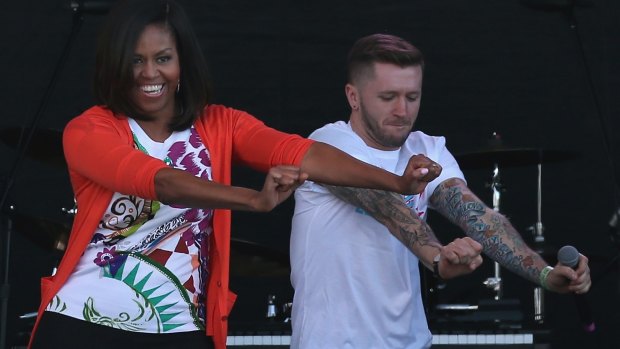 Michelle Obama dances with members of the All Stars from the television show So You Think You Can Dance during the annual White House Easter Egg Roll last year.