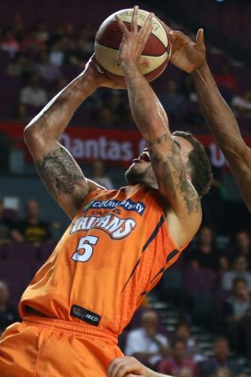 In the zone: US import Scottie Wilbekin scored 15 points for the Cairns Taipans.