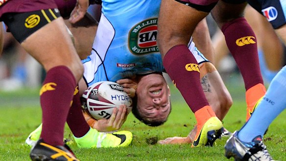'I think he's very lucky': Paul Gallen is spear tackled by Sam Thaiday.