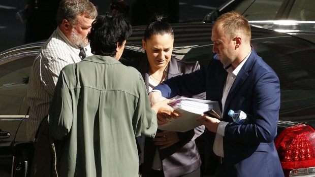 The family of late cricketer Phillip Hughes arrive at the inquest. 