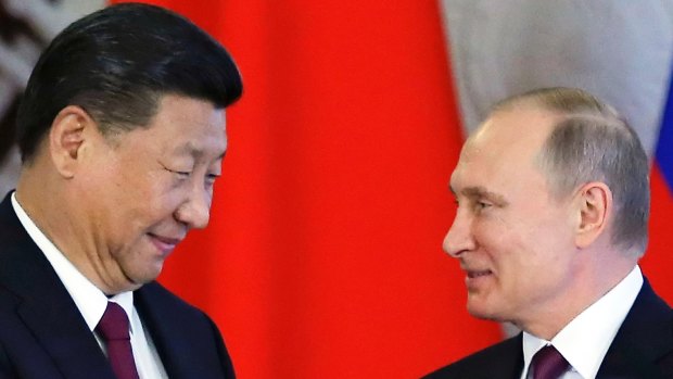 Chinese President Xi Jinping, left, with Russian President Vladimir Putin in the Kremlin on Tuesday.