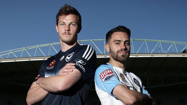 Anthony Caceres of Melbourne City and James Donachie of Melbourne Victory.
