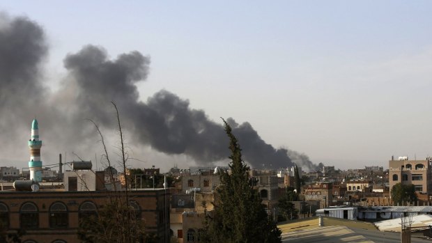 Smoke rises after a Saudi-led air strike hit an air base in Sanaa last week.
