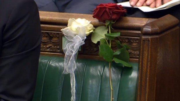A white and red rose where Jo Cox should have been sitting in parliament. 