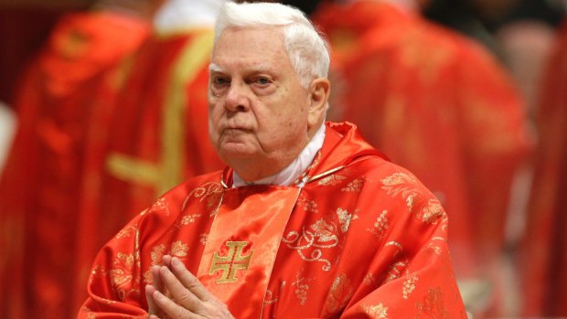 Cardinal Bernard Law attends a Mass for the election of a new pope at the Vatican in 2013.
