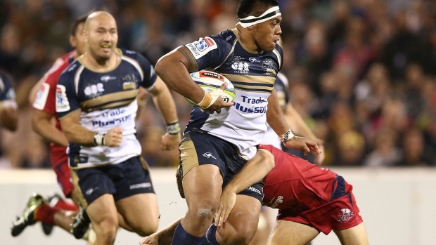 One-way traffic: The Brumbies open up during a woeful Reds effort.