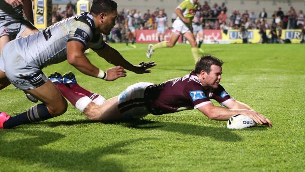 Lampooned: Jamie Lyon scores a try at Brookvale Oval on Saturday night.